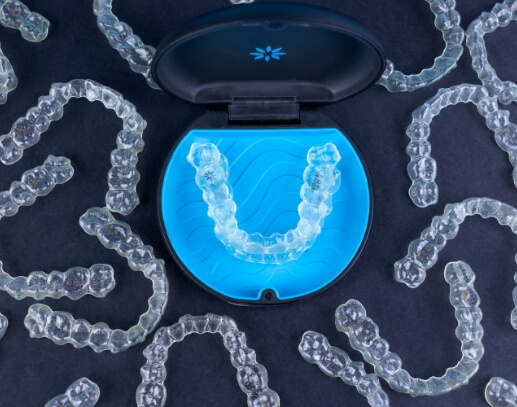 Invisalign aligners in and around a carrying case