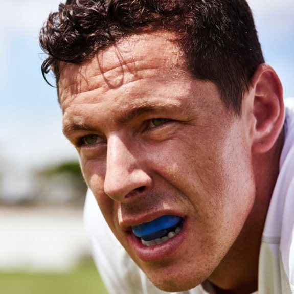 a man wearing a mouthguard during sports