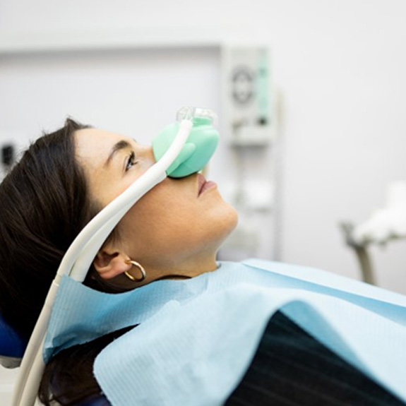 a patient undergoing nitrous oxide sedation dentistry