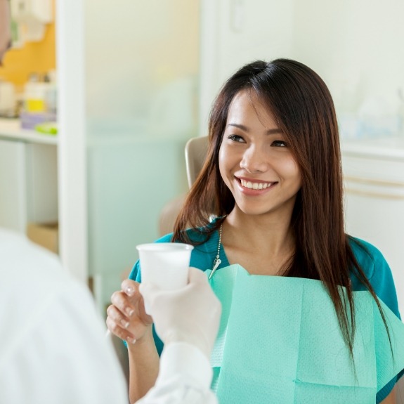 Woman talking to dentist during smile consultation