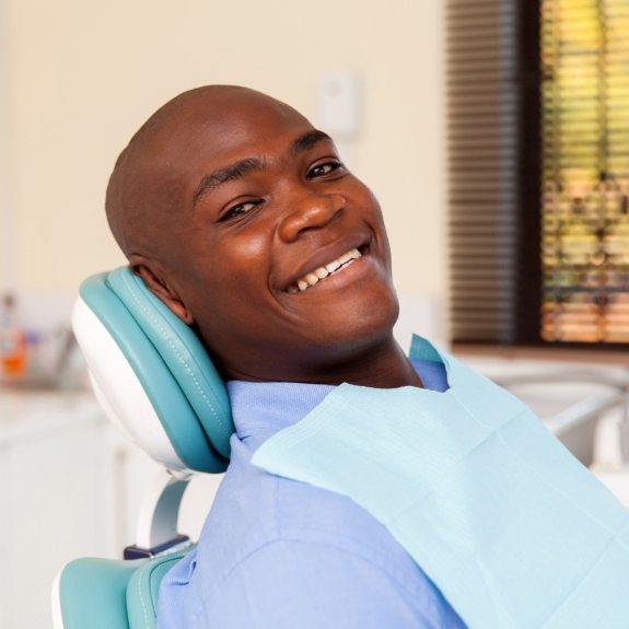 Man smiling during oral health assessment