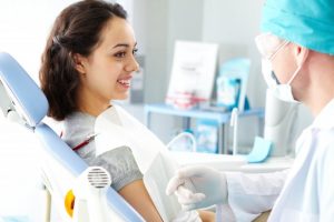 dentist talking to patient