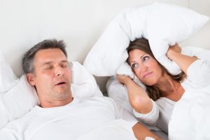 wife angry as husband snores