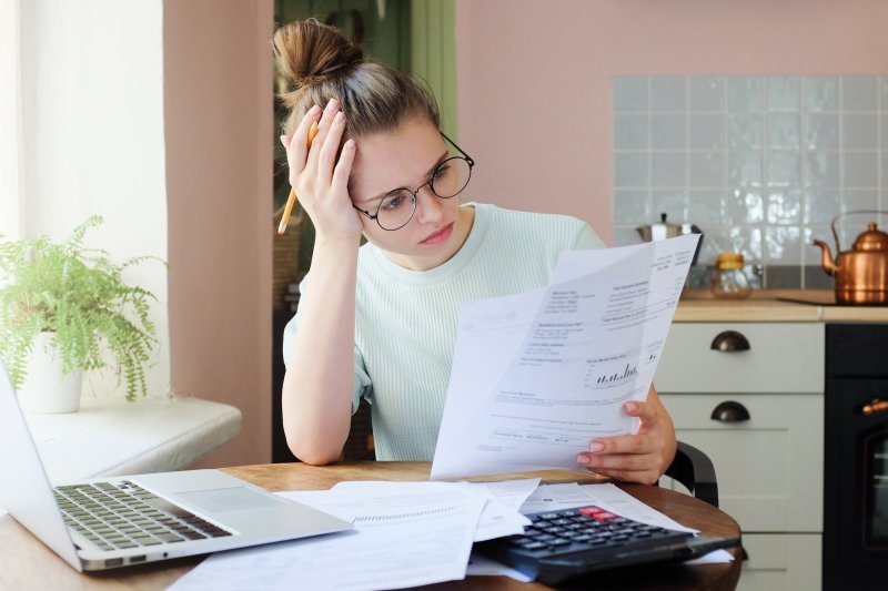 Woman looking over paperwork