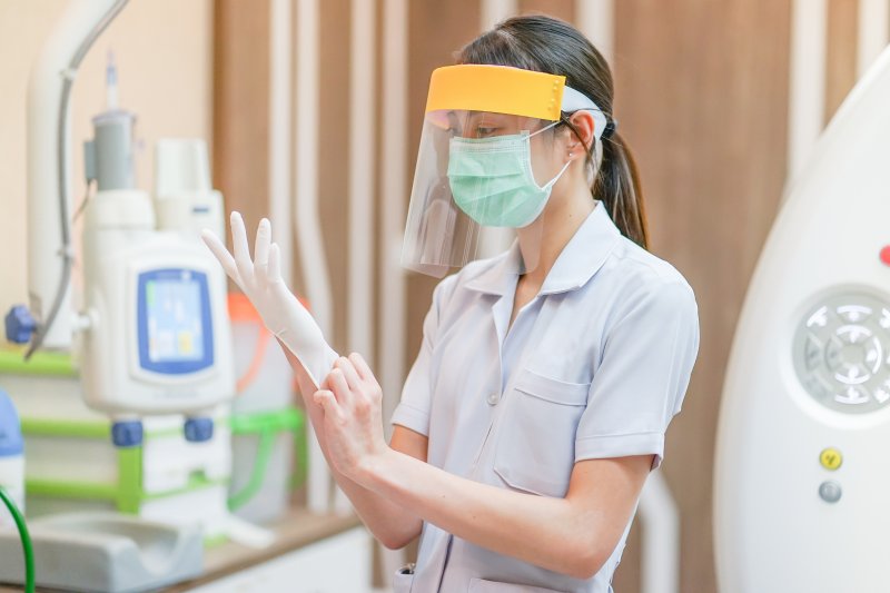 team member of dentist in Dublin wearing personal protective equipment