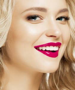 woman with a beautiful smile thanks to porcelain veneers in dublin oh